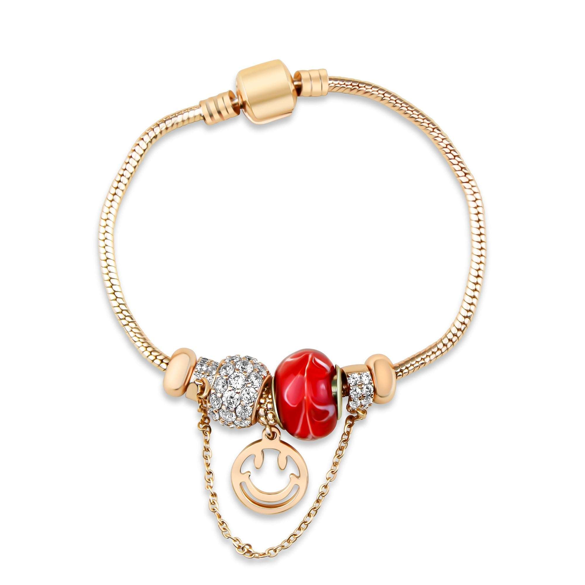 Rokassprādze ar zelta pārklājumu, sarkanu piekariņu un kristāliem