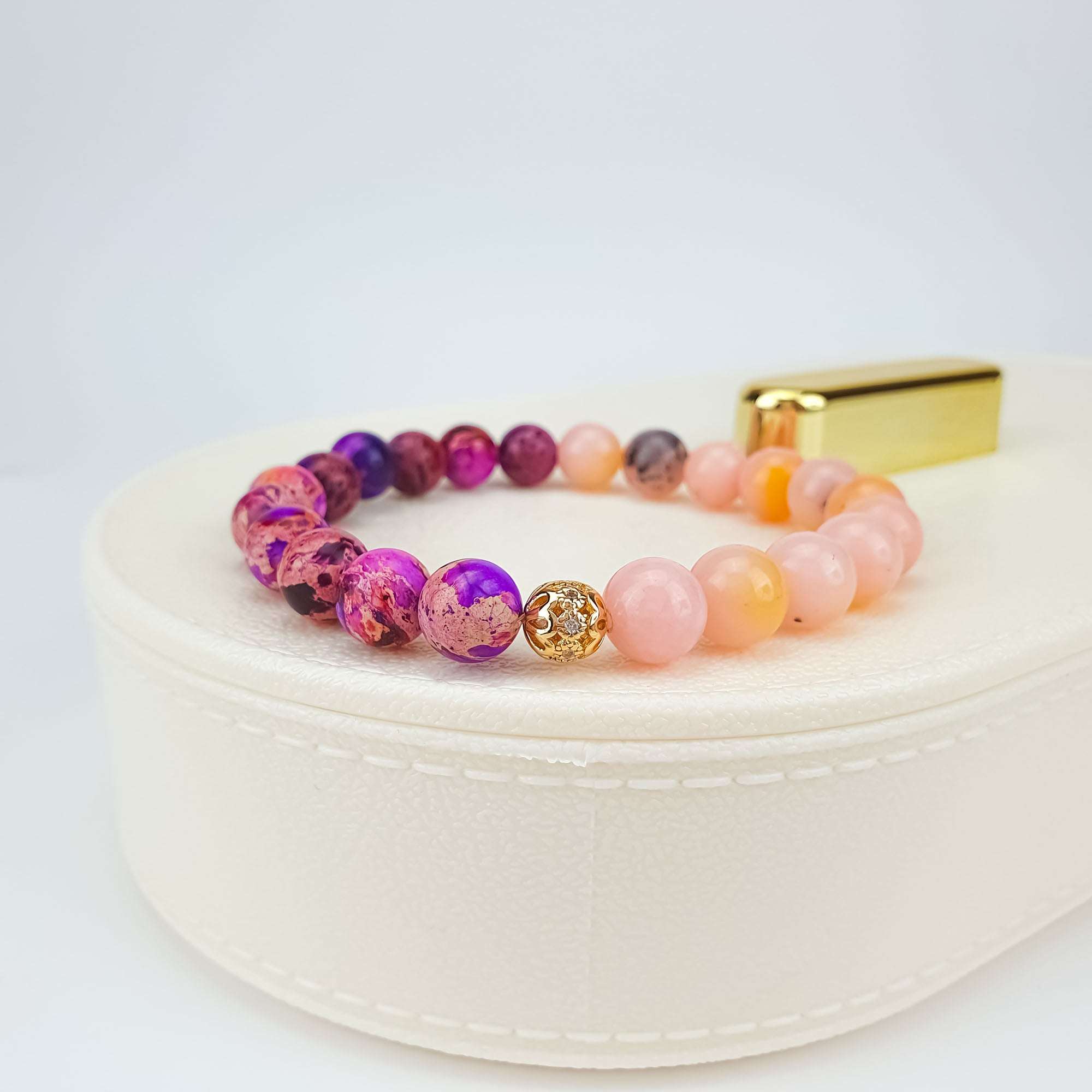 Sieviešu rokassprādze ar rozā, lillā un zelta akcentiem