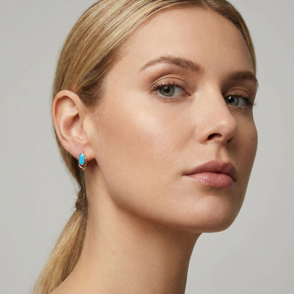 Kompakti auskari ar debeszīlu emāliju