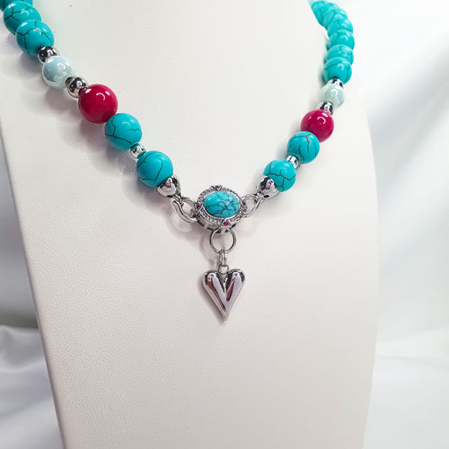 Gaiši zila akmeņu rota ar rozā detaļām